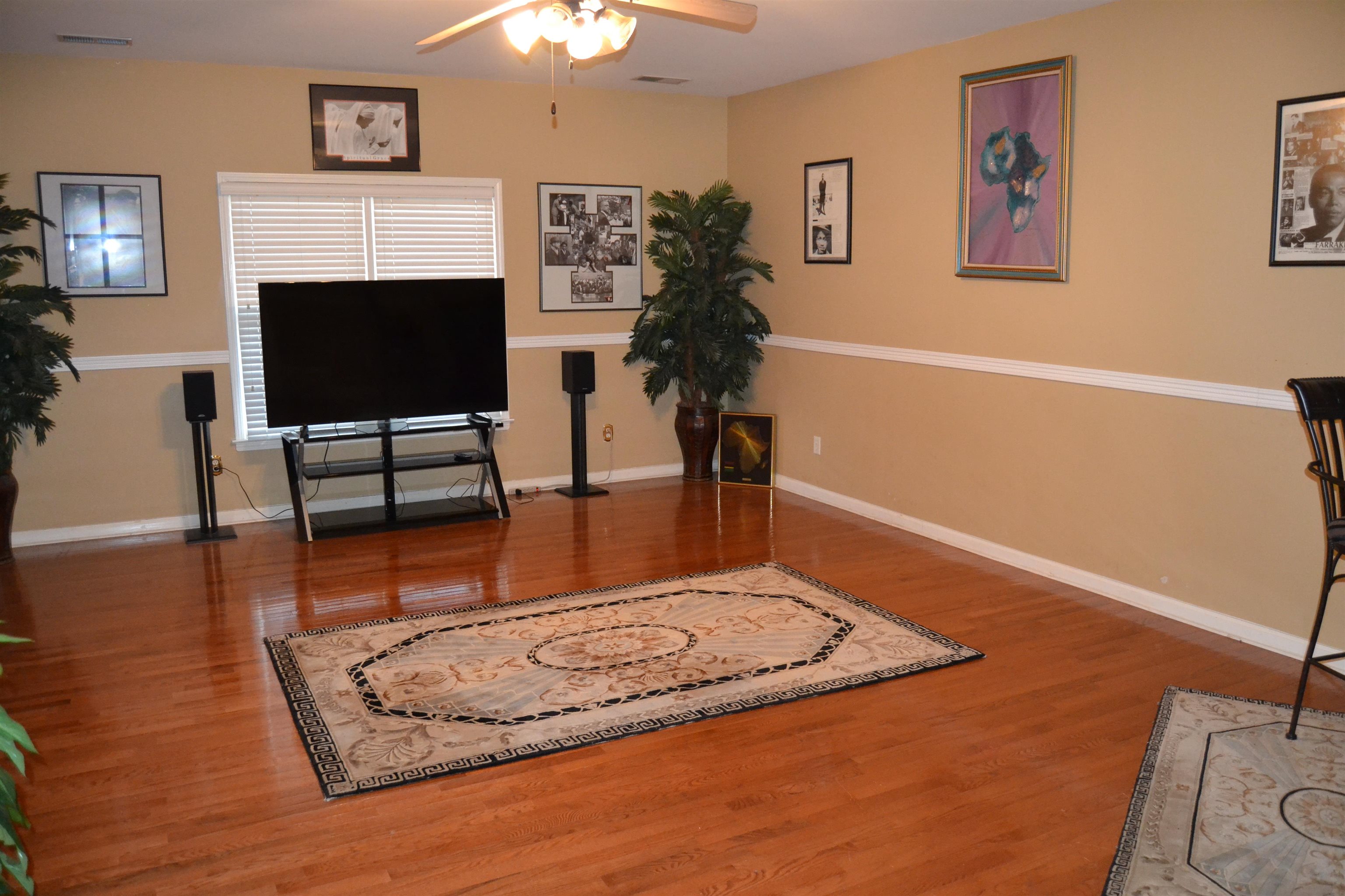 1364 Winoka Road Collierville, TN 38017 - Photo 19 of 25 a living room with furniture and a fireplace