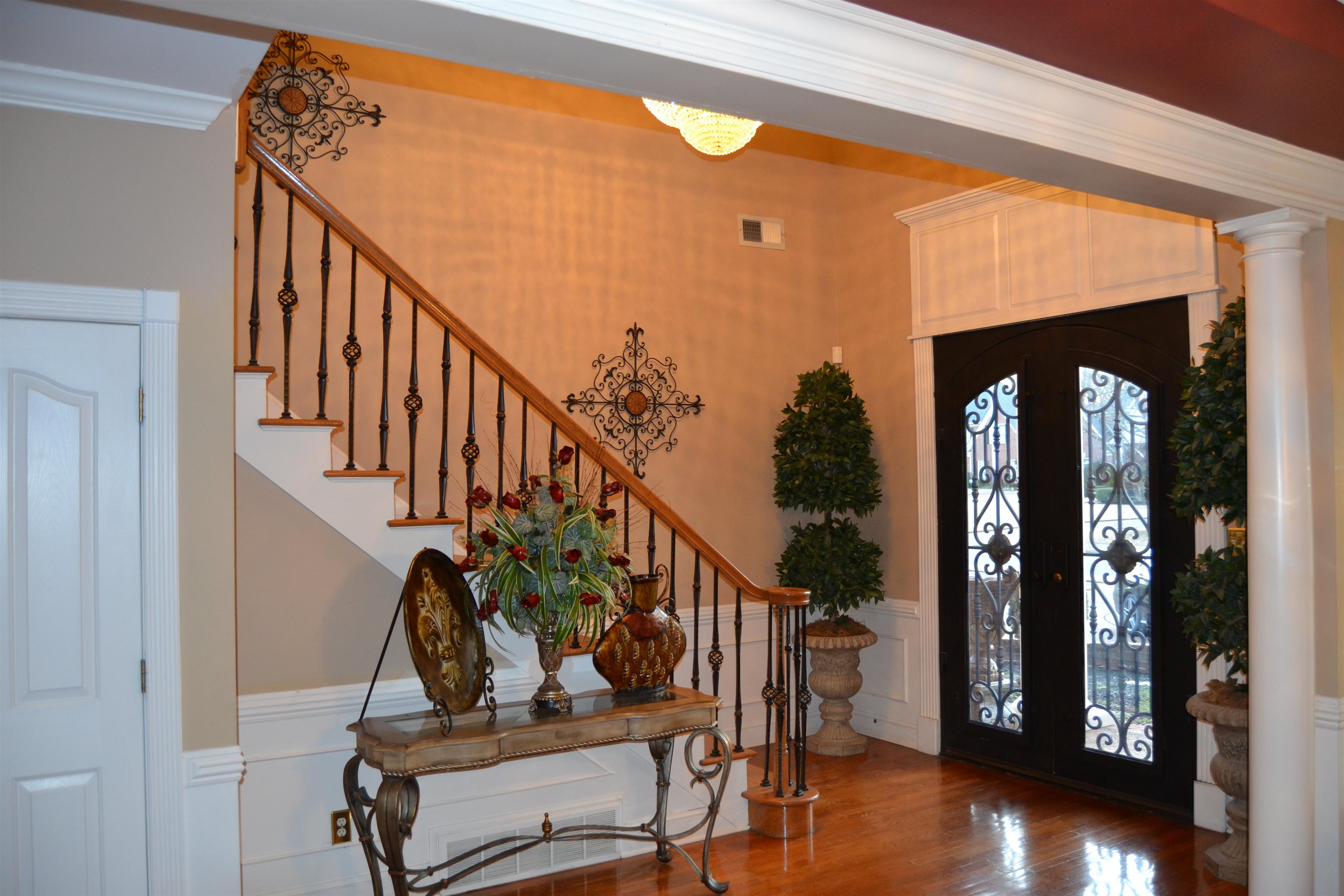 1364 Winoka Road Collierville, TN 38017 - Photo 5 of 25 a view of entryway and hall with wooden floor