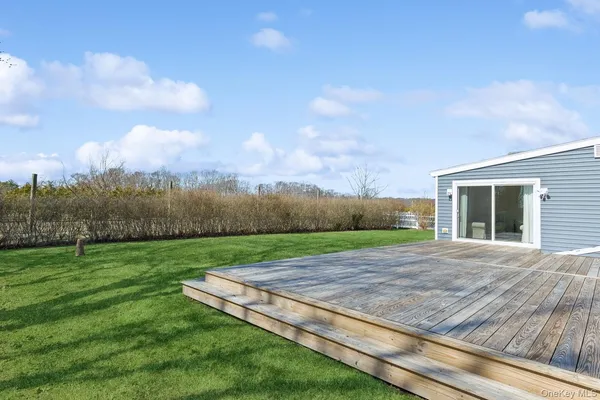 a view of a backyard with an outdoor space