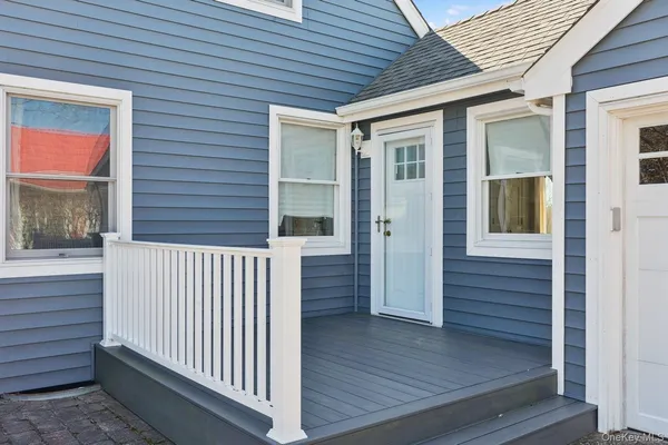 a view of porch with a chair