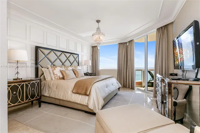 a spacious bathroom with a tub a sink and mirror