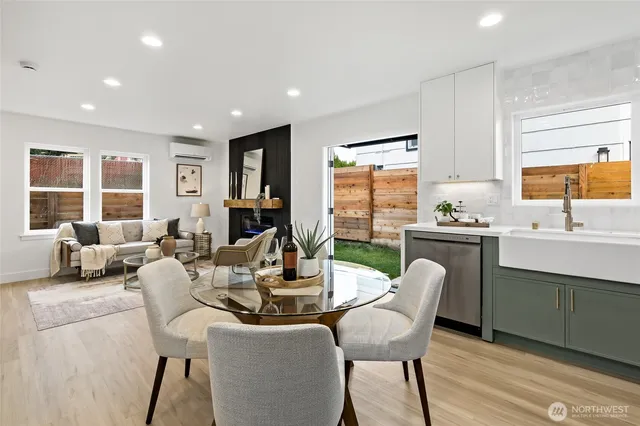 a view of a dining room with furniture window and outside view