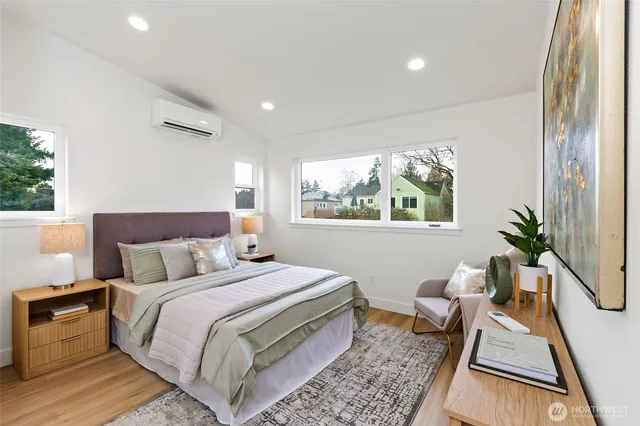 a bed room with a bed and a couch