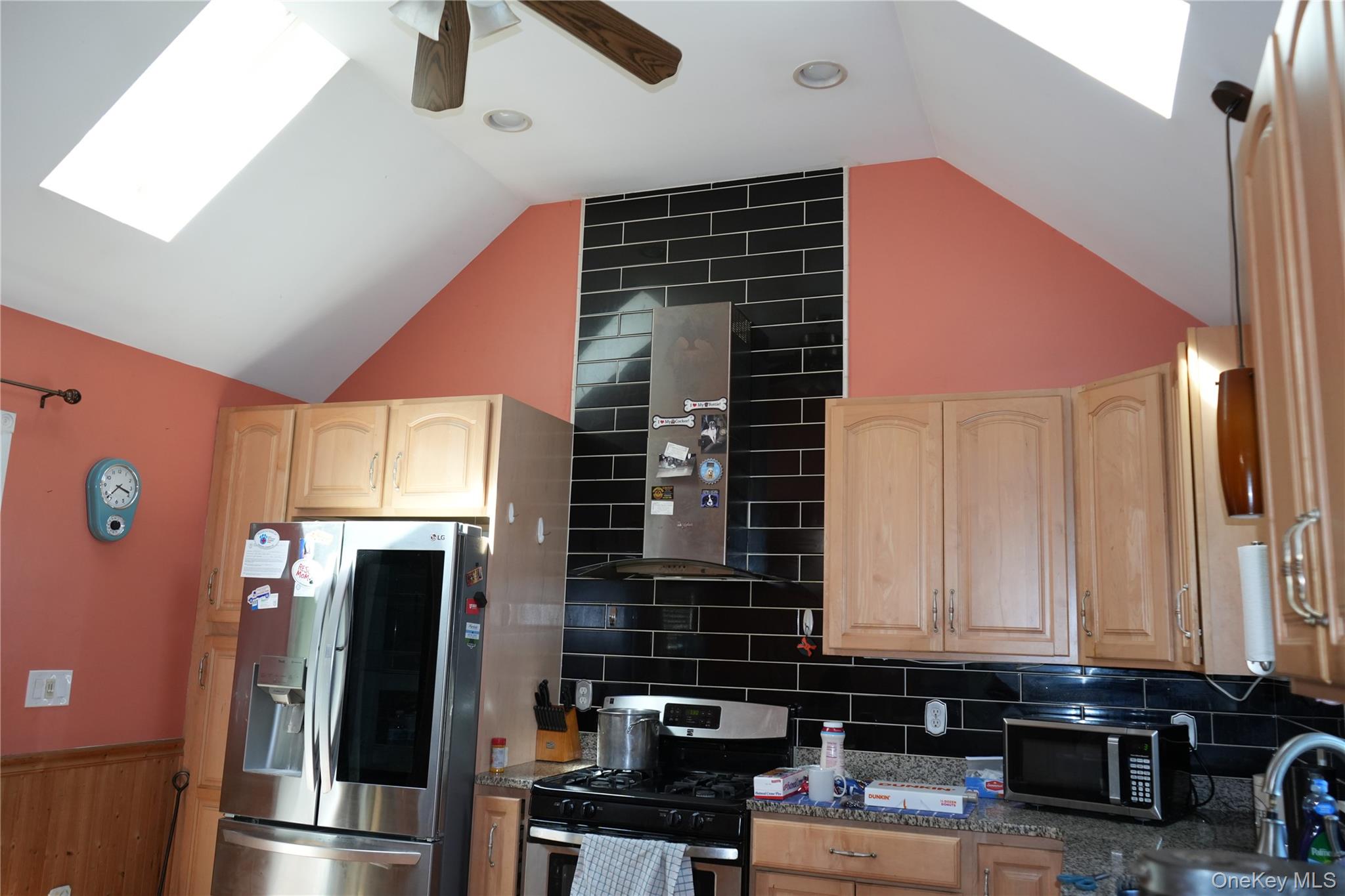 27 Spruce Street Lake Peekskill, NY 10537 - Photo 11 of 23 a kitchen with refrigerator and window
