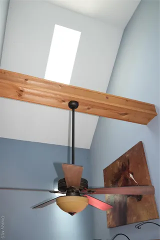 a room with furniture and a window