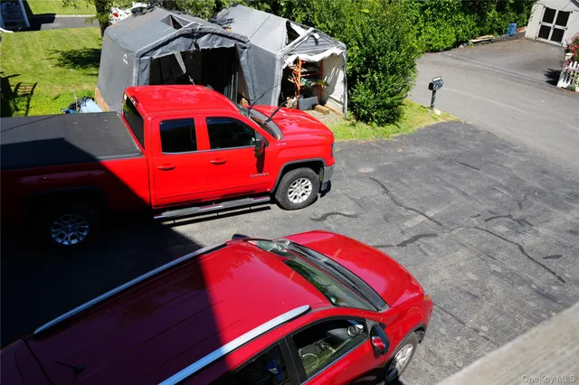 a car parked in front of a house