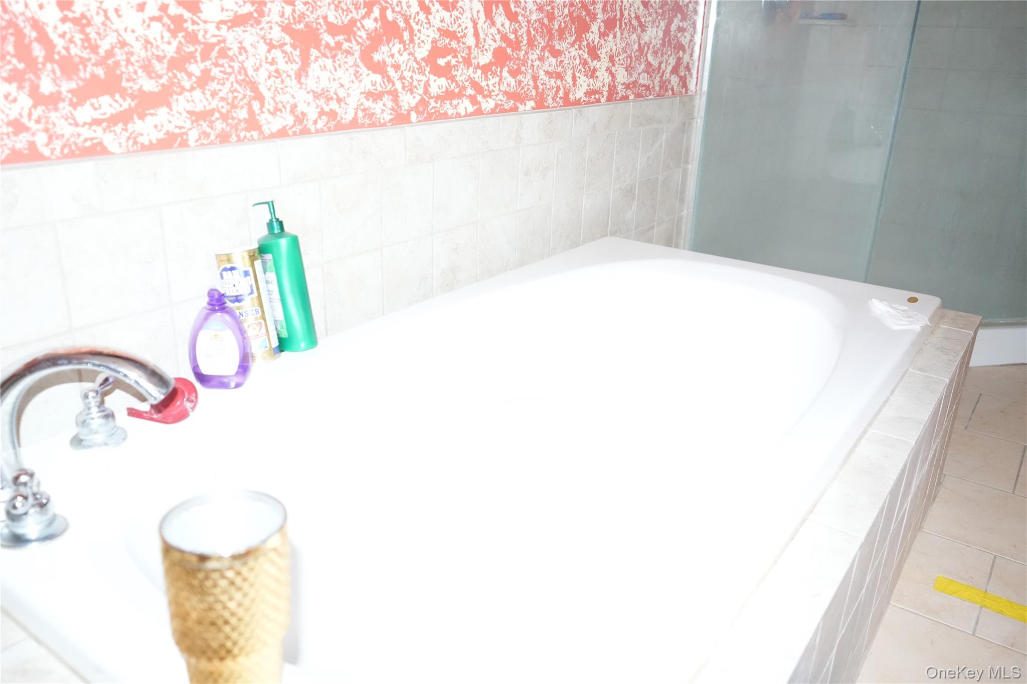 27 Spruce Street Lake Peekskill, NY 10537 - Photo 21 of 23 a bathroom with a sink and a shower curtain