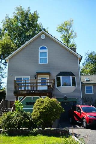 a house view with a garden space