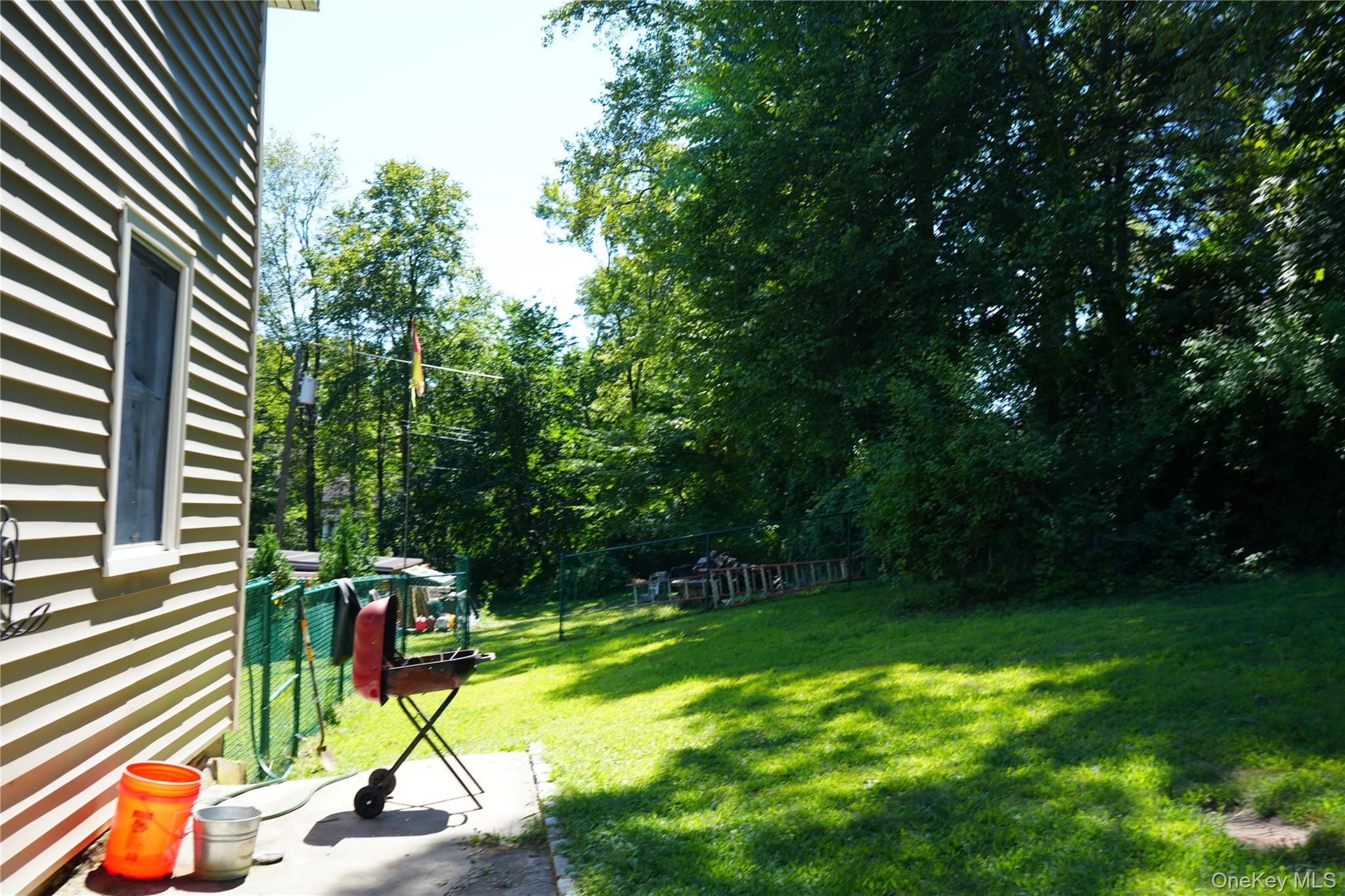 27 Spruce Street Lake Peekskill, NY 10537 - Photo 5 of 23 a view of a backyard