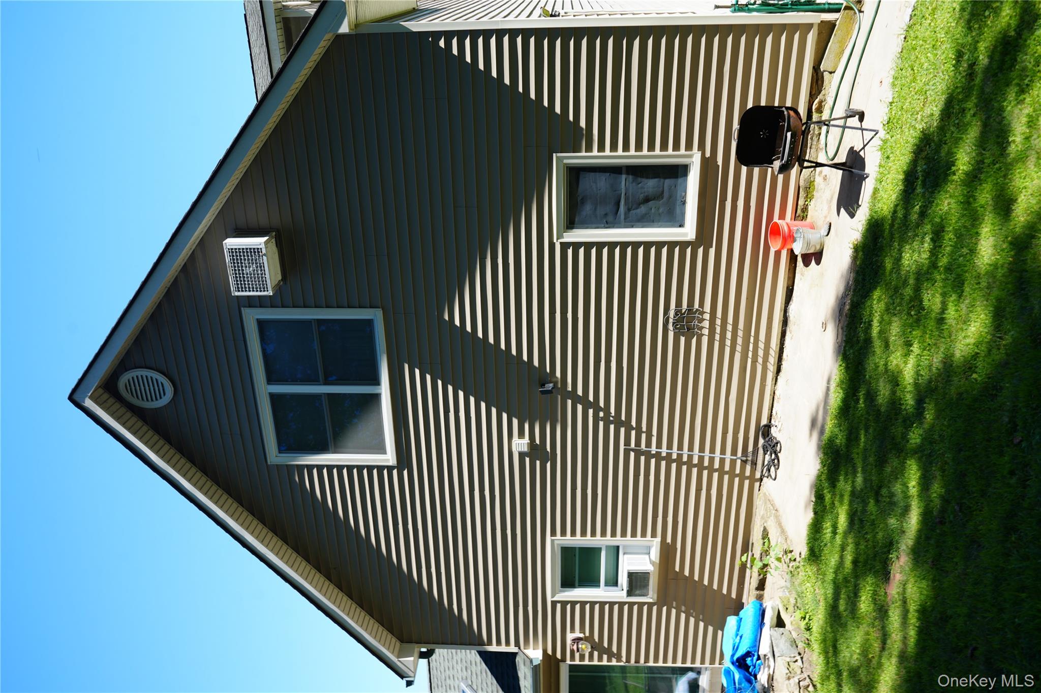 27 Spruce Street Lake Peekskill, NY 10537 - Photo 7 of 23 a front view of house with yard