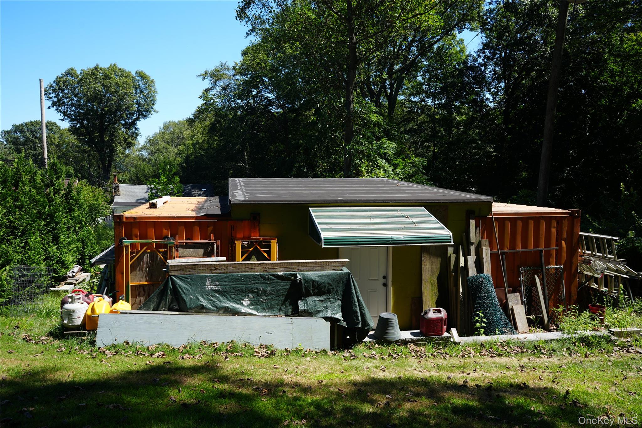 27 Spruce Street Lake Peekskill, NY 10537 - Photo 9 of 23 an outdoor space with lots of swings and slides
