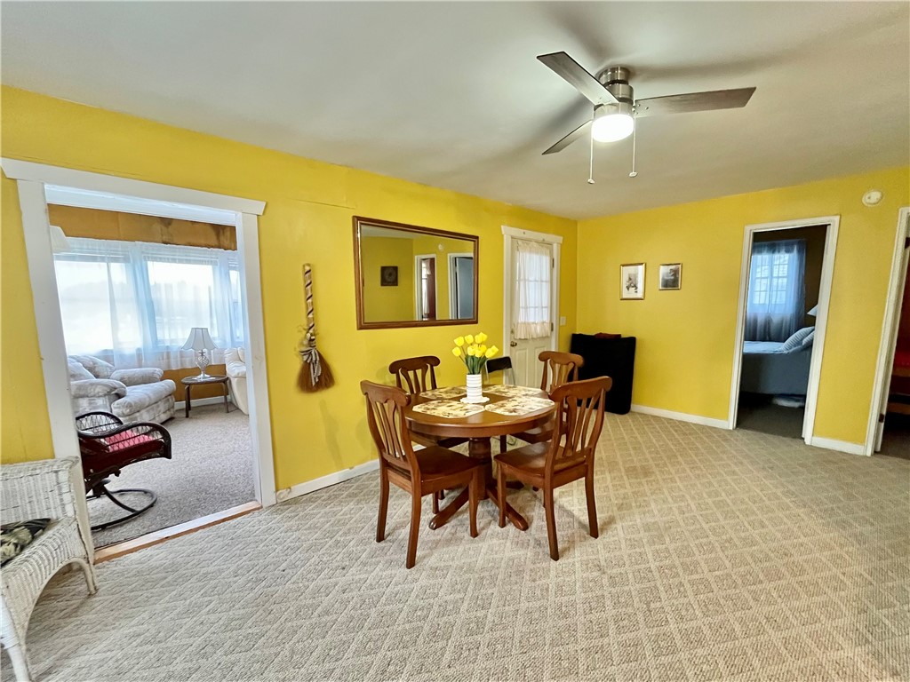 7854 Eagle Road Wolcott, NY 14590 - Photo 11 of 23 Dining area open to kitchen
