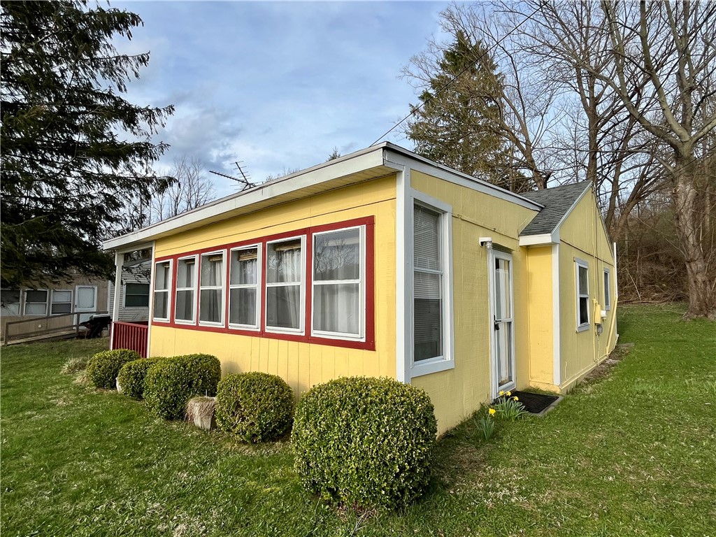 7854 Eagle Road Wolcott, NY 14590 - Photo 2 of 23
This fully furnished 2 bedroom seasonal cottage w