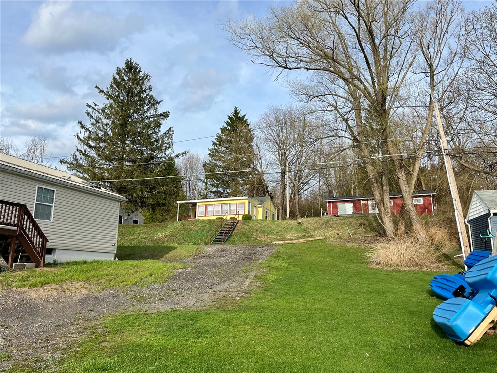 7854 Eagle Road Wolcott, NY 14590 - Photo 23 of 23 View of cottage from the water access lot