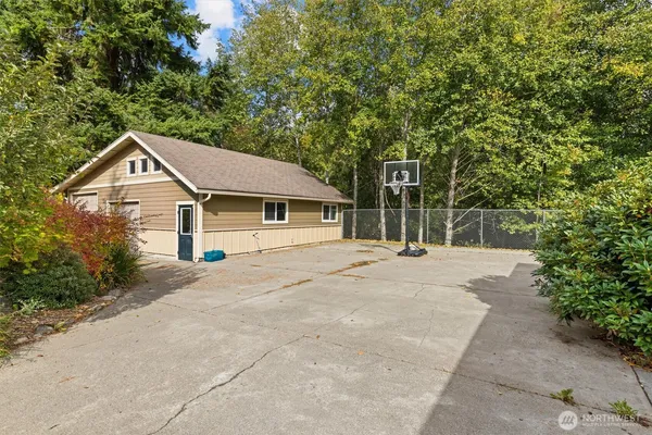 a house with trees in the background
