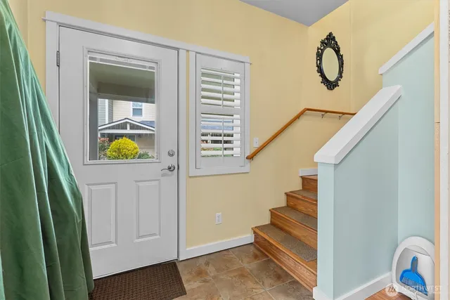 a view of an entryway with staircase