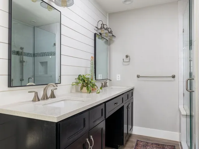 a bathroom with a sink and a mirror