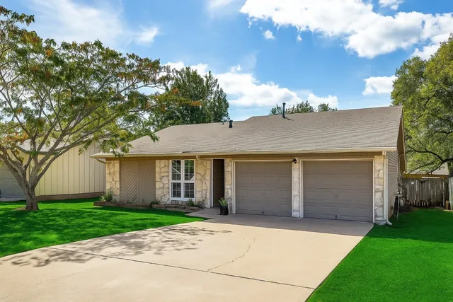 front view of house with a yard