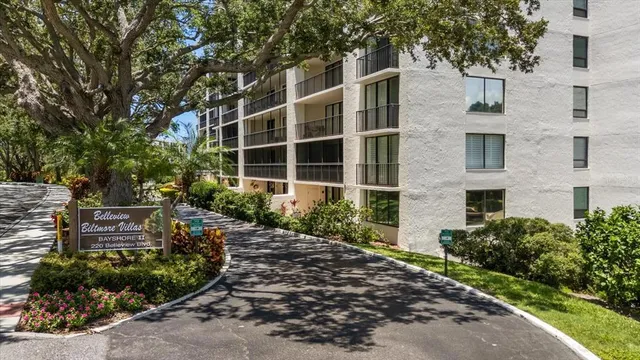 a view of a car park in front of a building