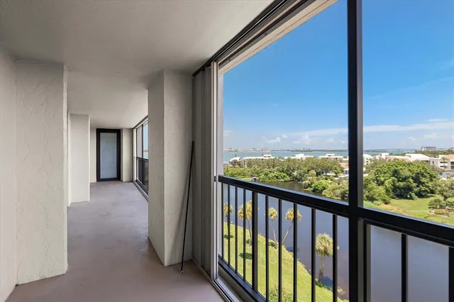 a view of a glass door and a balcony