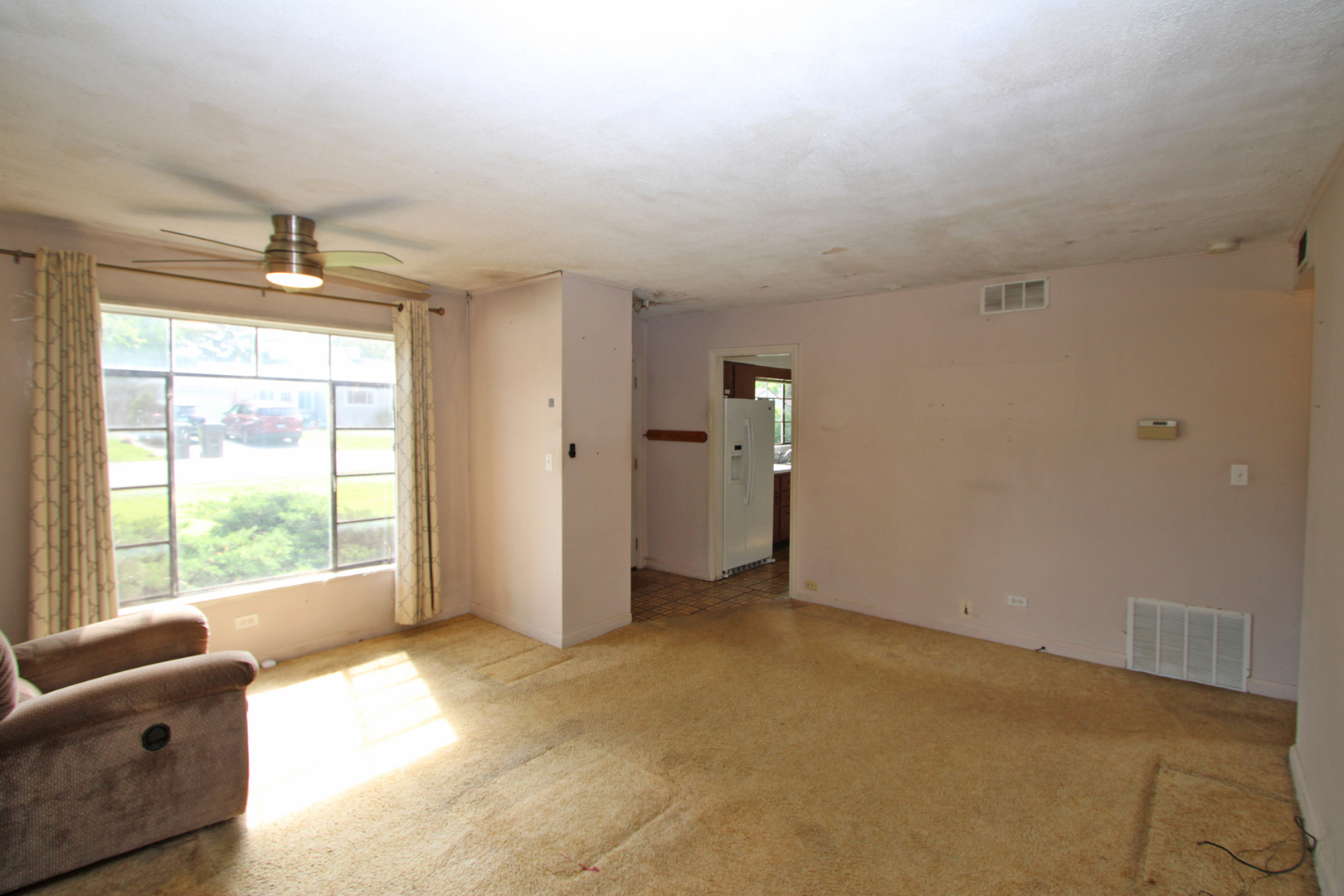 20 Johnathan Road Lake Zurich, IL 60047 - Photo 4 of 31 a view of an empty room with a window