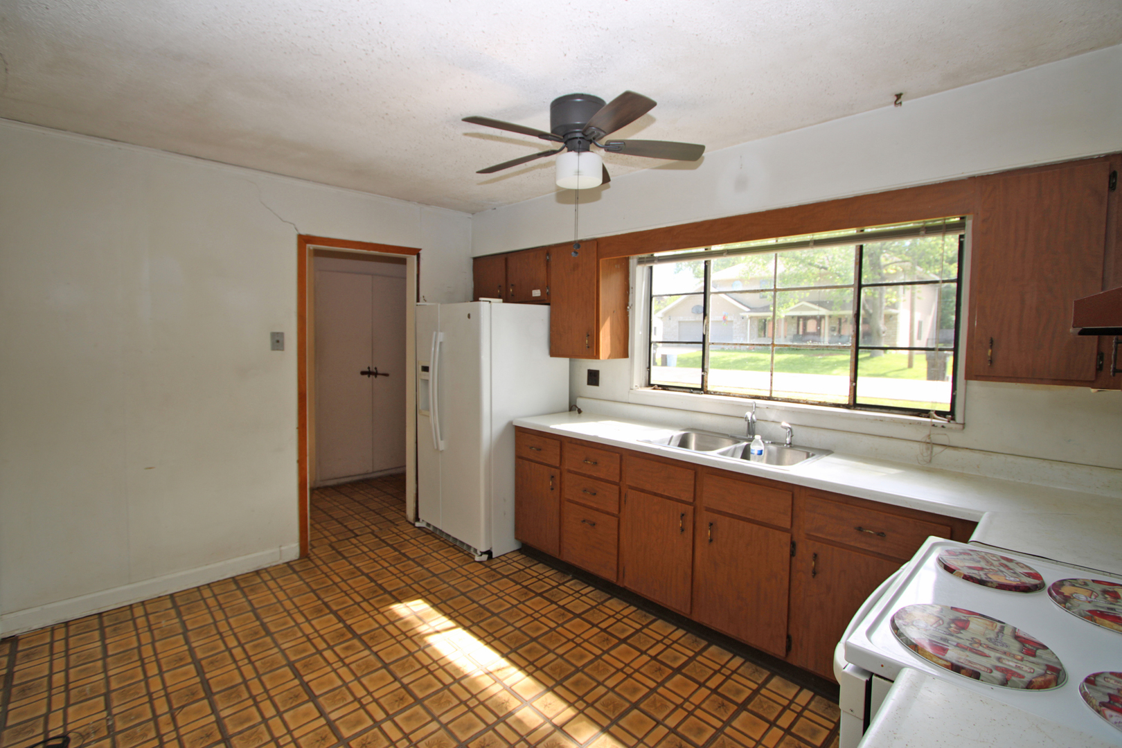 20 Johnathan Road Lake Zurich, IL 60047 - Photo 8 of 31 a kitchen with a sink and a window