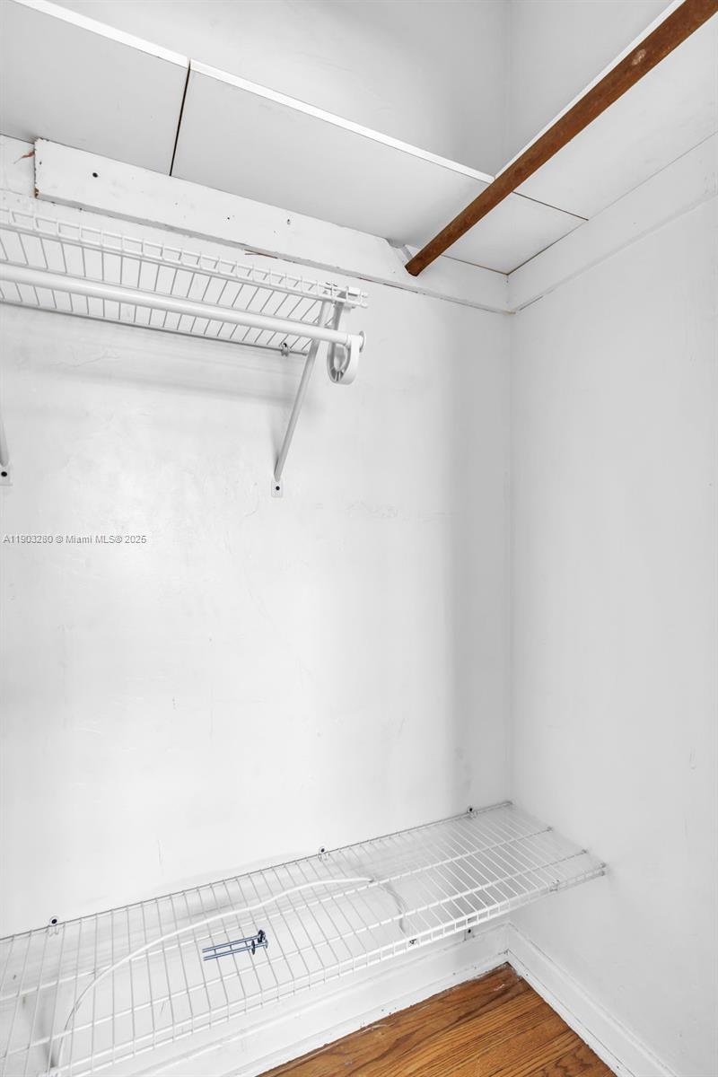 175 West 56th Street Hialeah, FL 33012 - Photo 19 of 39 a view of a room with racks on the wall