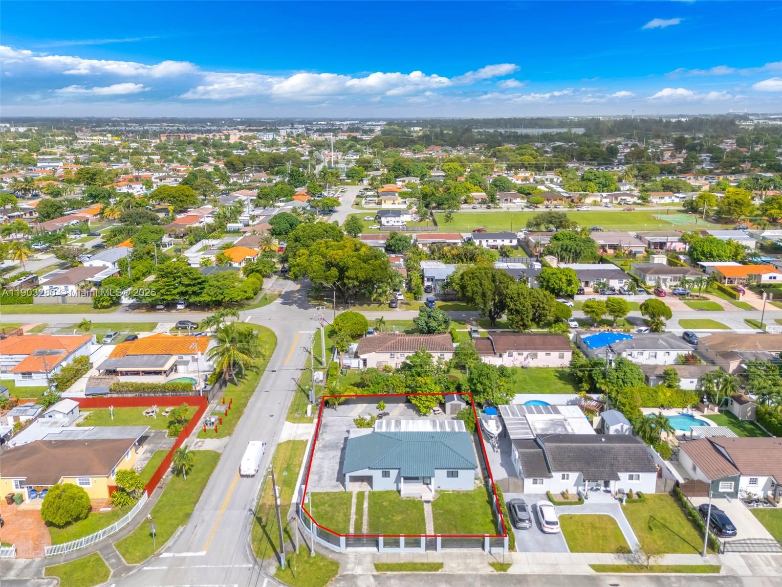 175 West 56th Street Hialeah, FL 33012 - Photo 34 of 39 an aerial view of residential houses with outdoor space and ocean view