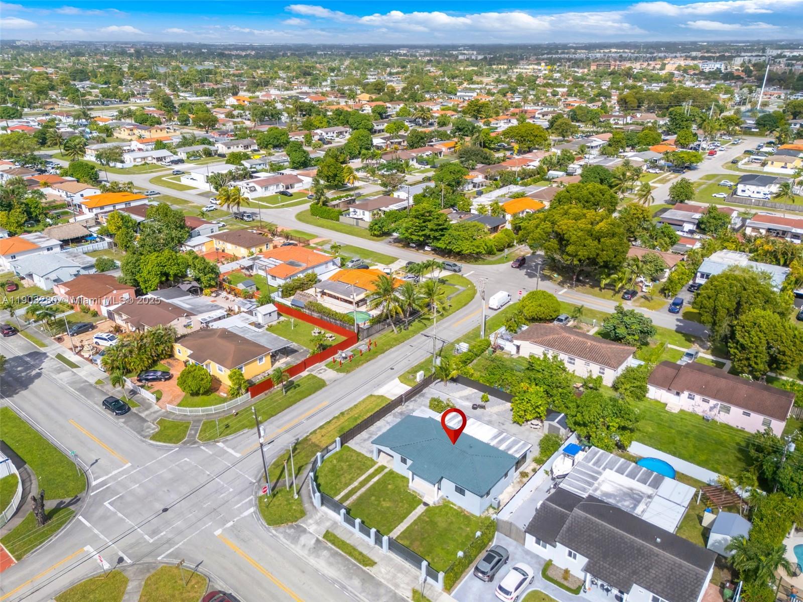 175 West 56th Street Hialeah, FL 33012 - Photo 35 of 39 an aerial view of residential houses with outdoor space