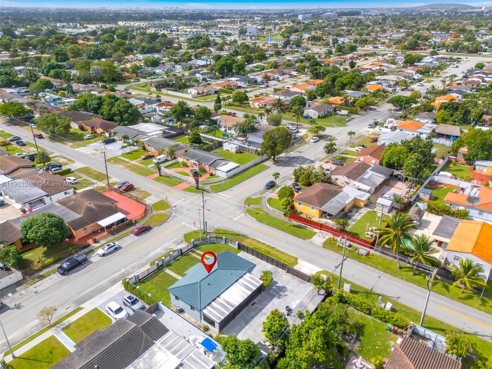 175 West 56th Street Hialeah, FL 33012 - Photo 36 of 39 an aerial view of residential houses with outdoor space