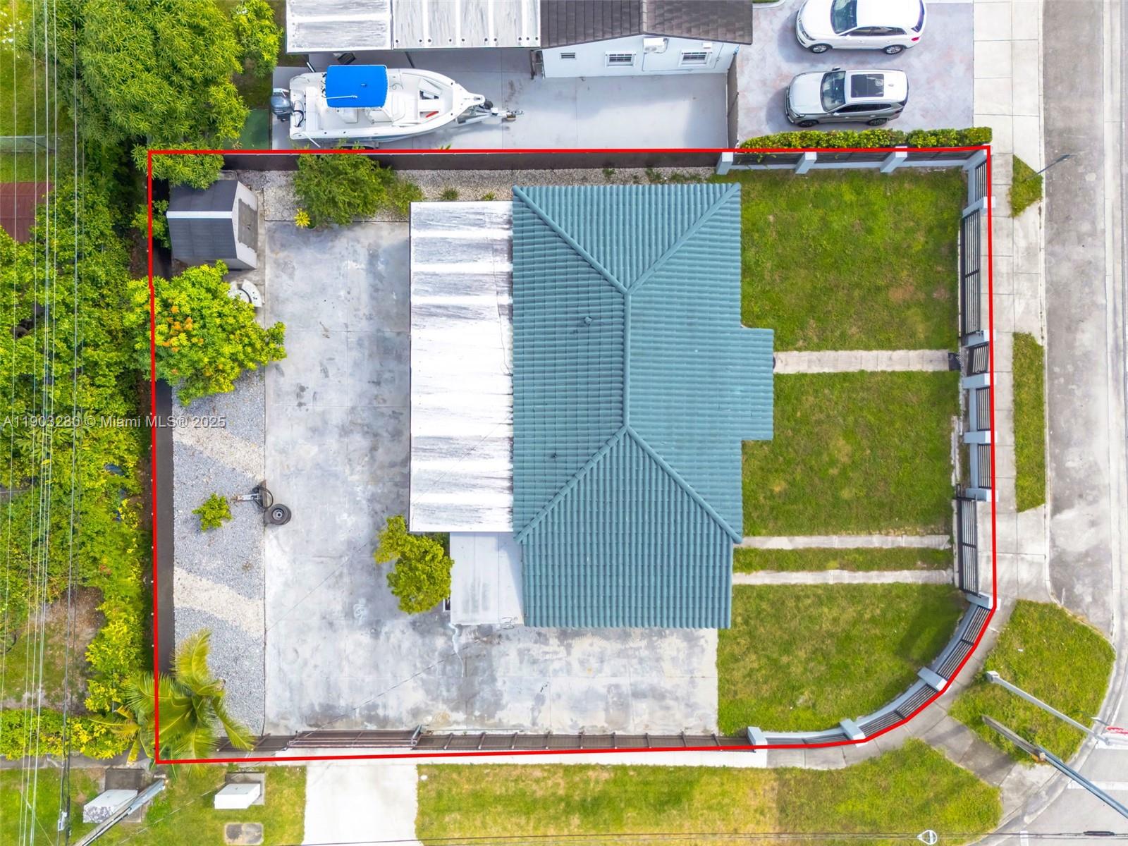175 West 56th Street Hialeah, FL 33012 - Photo 39 of 39 a view of a swimming pool with a yard