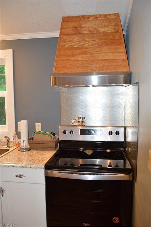 2884 Christian Home Church Road Traphill, NC 28685 - Photo 8 of 29 range with custom vent hood