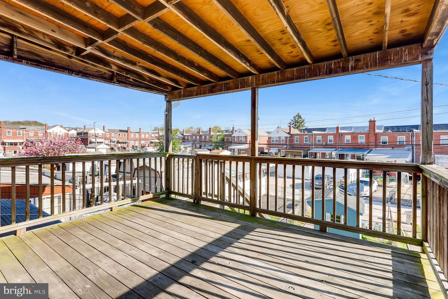 7530 Westfield Road Baltimore, MD 21222 - Photo 26 of 30 a view of balcony with wooden floor