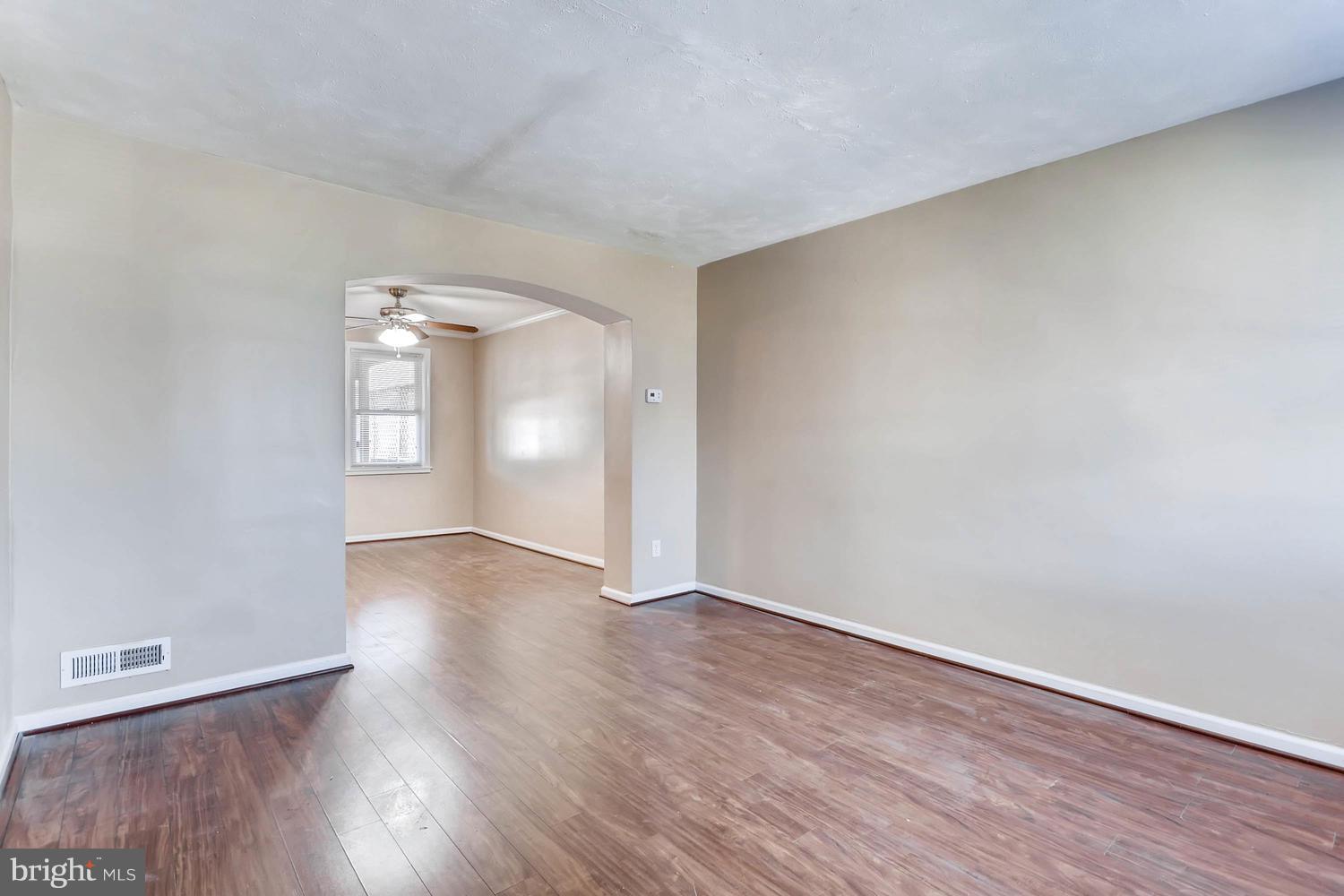 7530 Westfield Road Baltimore, MD 21222 - Photo 5 of 30 wooden floor in an empty room