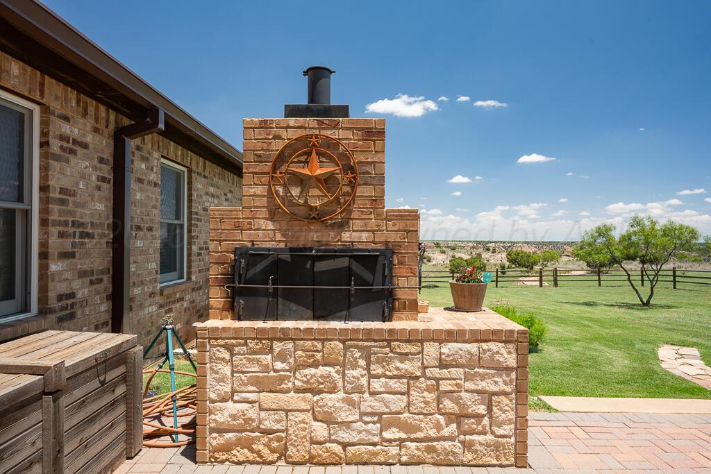7701 Canyon Bend Road Amarillo, TX 79118 - Photo 7 of 67 backyard 2