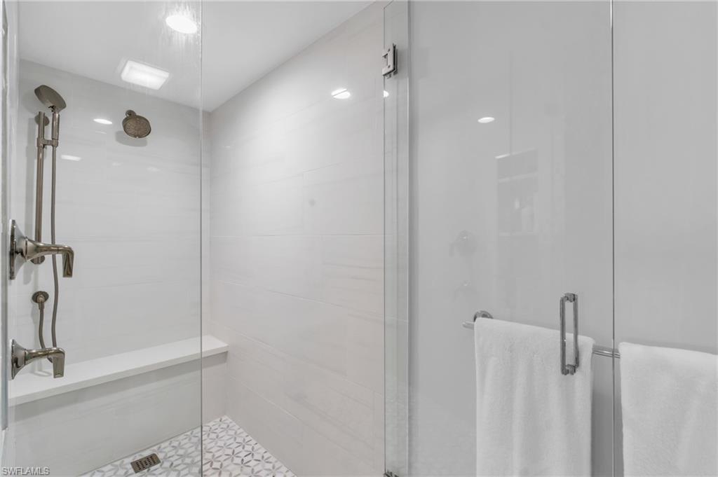 6573 Marissa Loop, Unit 1403 Naples, FL 34108 - Photo 17 of 29 a bathroom with a shower