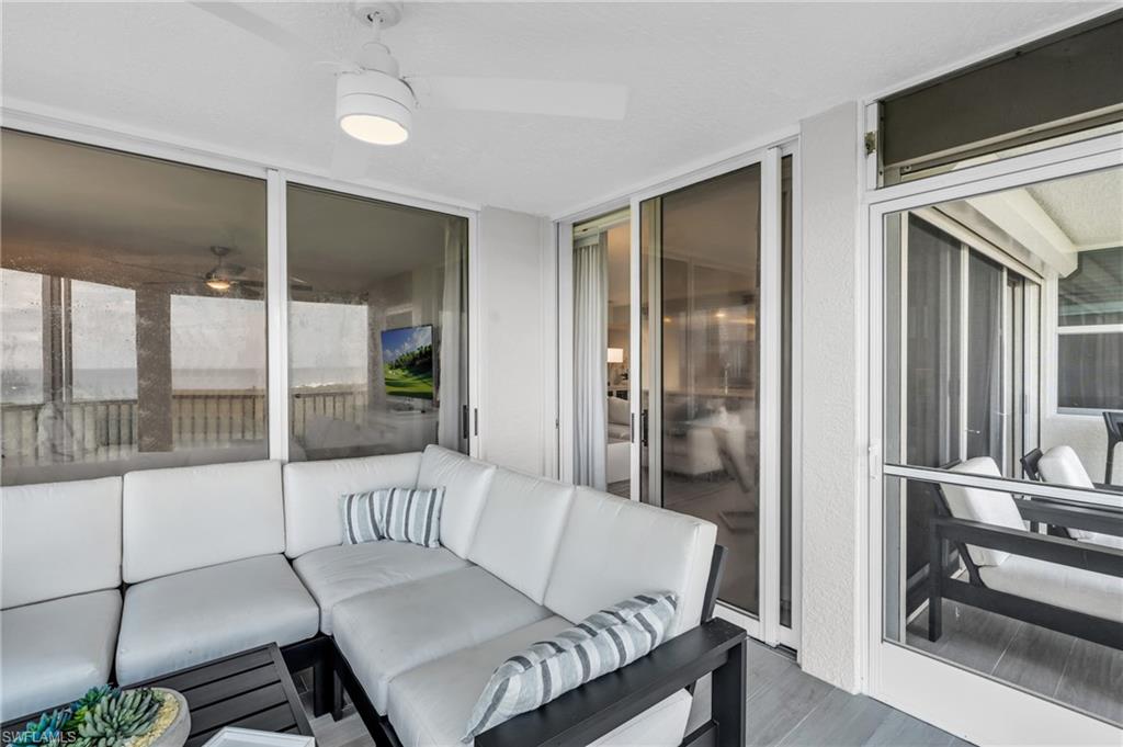6573 Marissa Loop, Unit 1403 Naples, FL 34108 - Photo 21 of 29 a living room with furniture