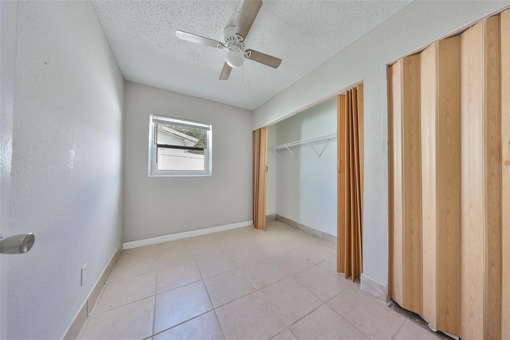 11708 Balm Riverview Road Riverview, FL 33569 - Photo 32 of 37 a view of an empty room with a window