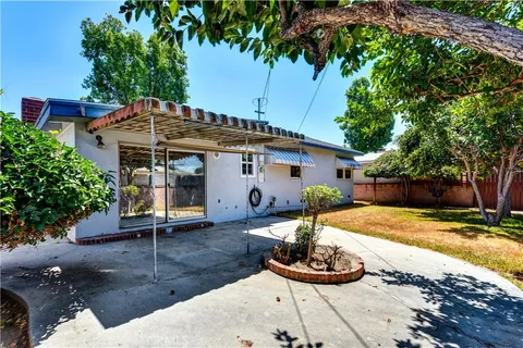 a house with trees in front of it