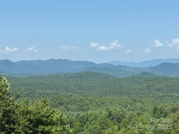 a view of an outdoor space and mountain view