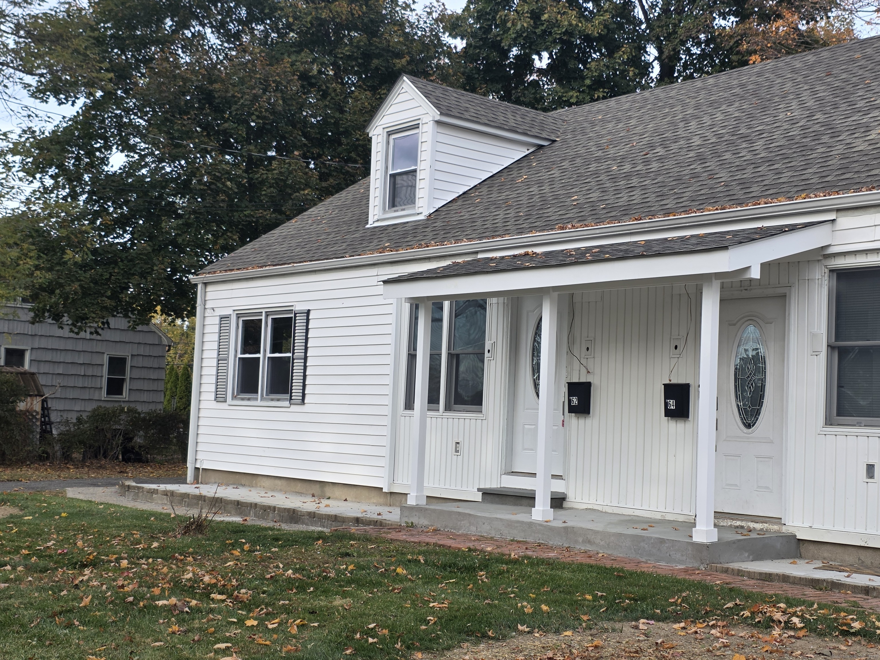 62 Pond Point Avenue Milford, CT 06460 - Photo 2 of 15 a front view of a house with garden