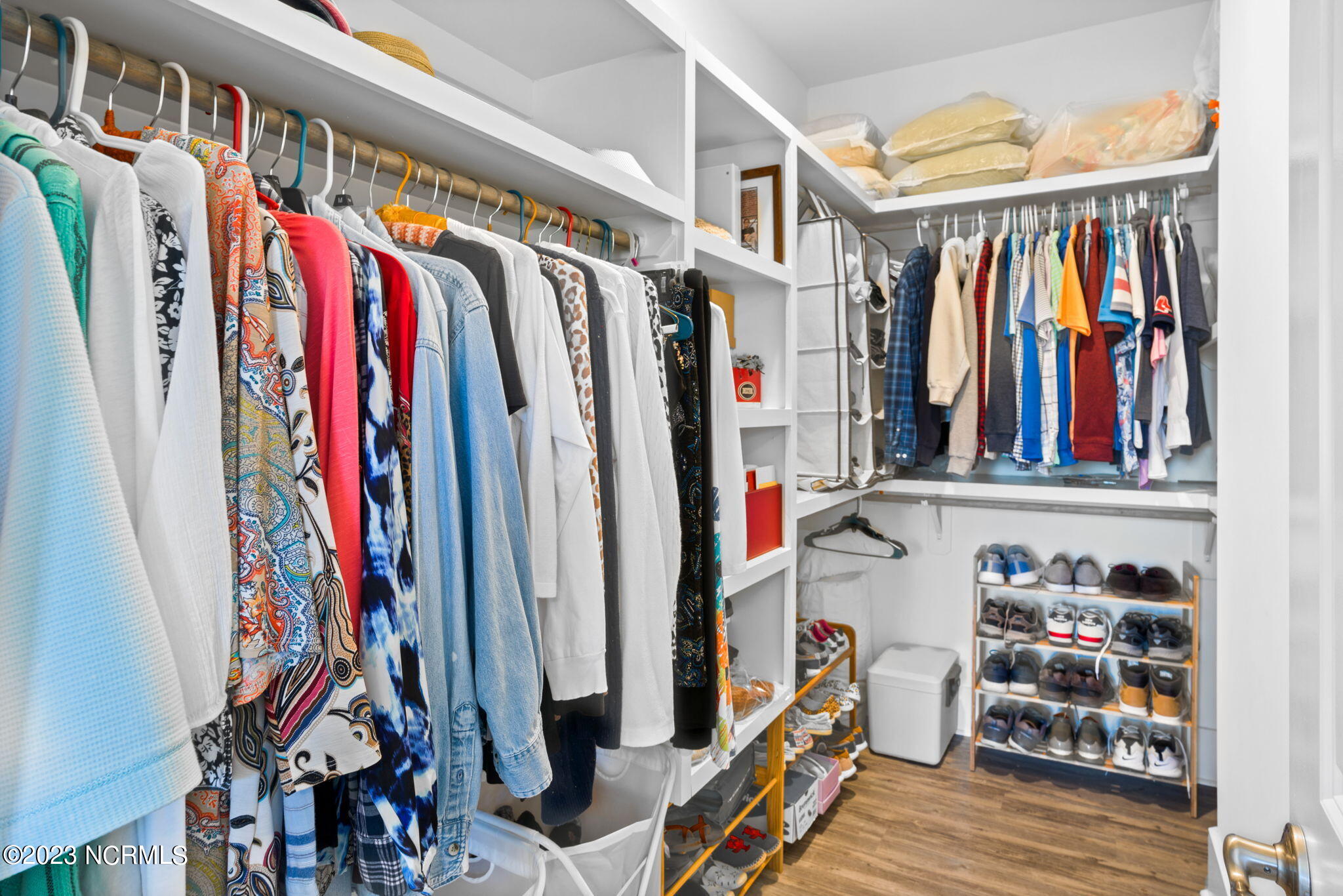 1423 Long Pond Road Southwest Ocean Isle Beach, NC 28469 - Photo 41 of 57 Master walk-in closet with built in shelving