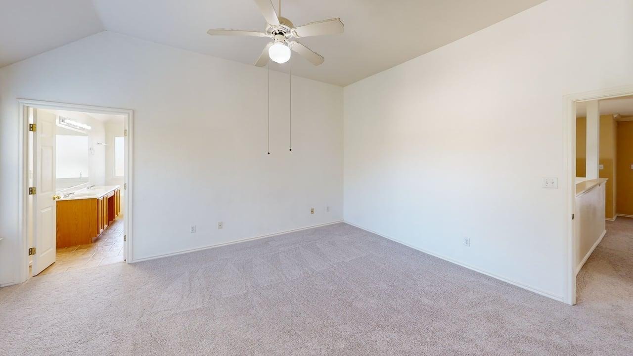 1716 Rosenborough Lane South Round Rock, TX 78665 - Photo 17 of 26 an empty room with a window and a ceiling fan