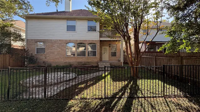 a view of a balcony with wooden floor