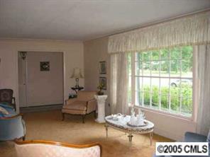 4200 Cheltenham Road Charlotte, NC 28211 - Photo 3 of 8 a living room with furniture and a large window