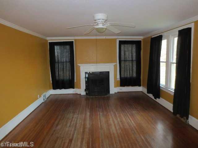 5356 Old Rural Hall Road Winston-Salem, NC 27105 - Photo 3 of 16 Living Room. Lovely wood floors, wide baseboards and classic fireplaces and mantles...
