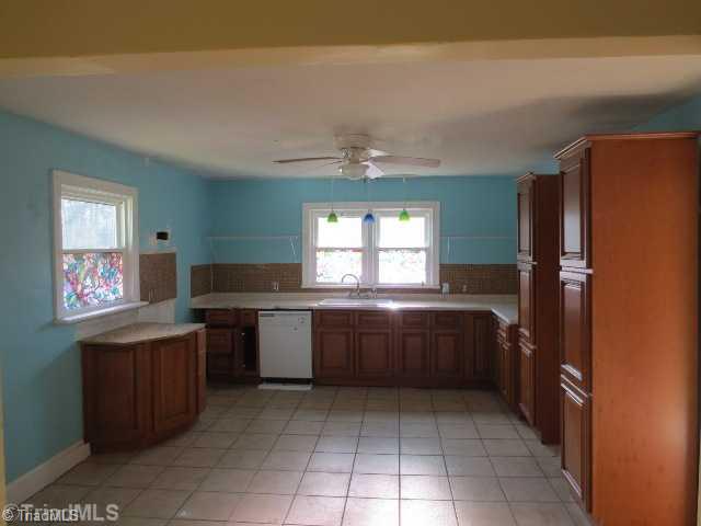5356 Old Rural Hall Road Winston-Salem, NC 27105 - Photo 6 of 16 Kitchen. Tile floors, recent cabinets and newer fixtures...plenty of room for an island and a breakfast table!