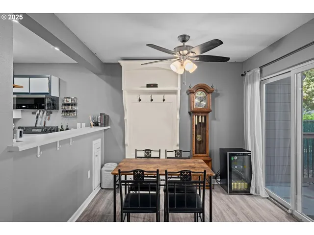 a kitchen with a table and chairs