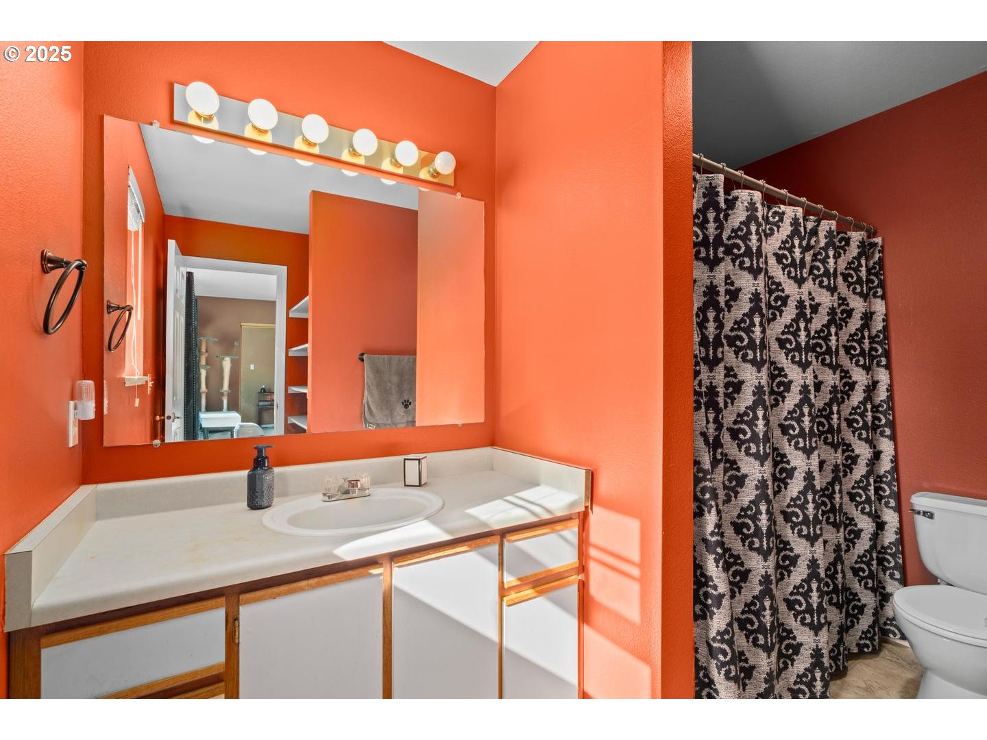 7143 Southwest Sagert Street, Unit 104 Tualatin, OR 97062 - Photo 24 of 33 a bathroom with a sink and a mirror