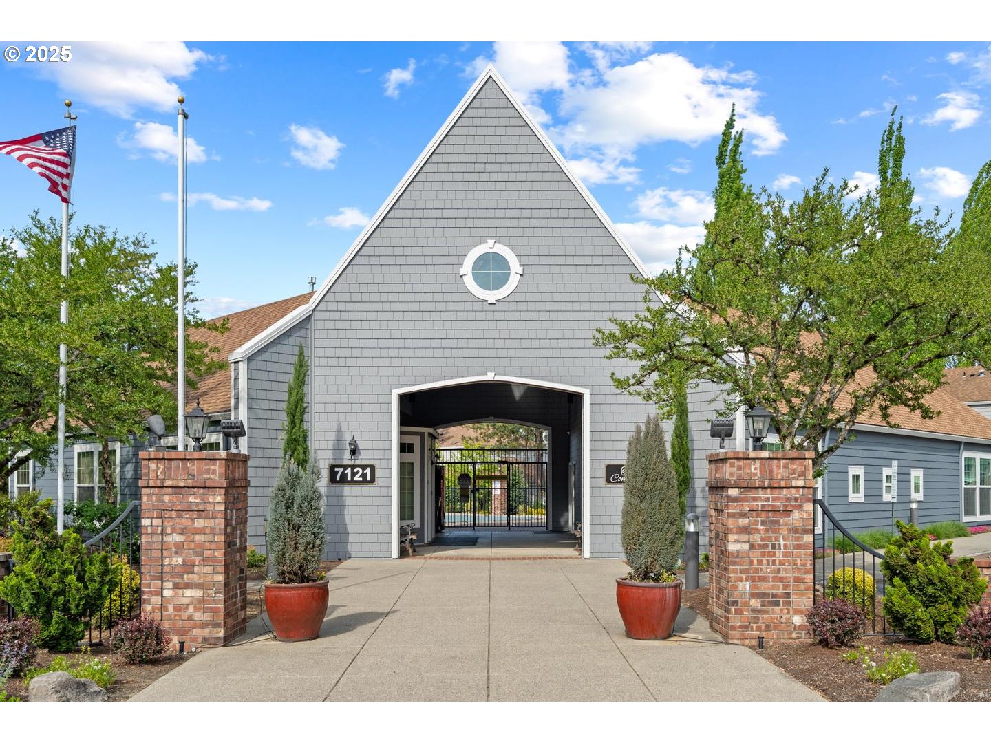 7143 Southwest Sagert Street, Unit 104 Tualatin, OR 97062 - Photo 26 of 33 a backyard of a house with seating space